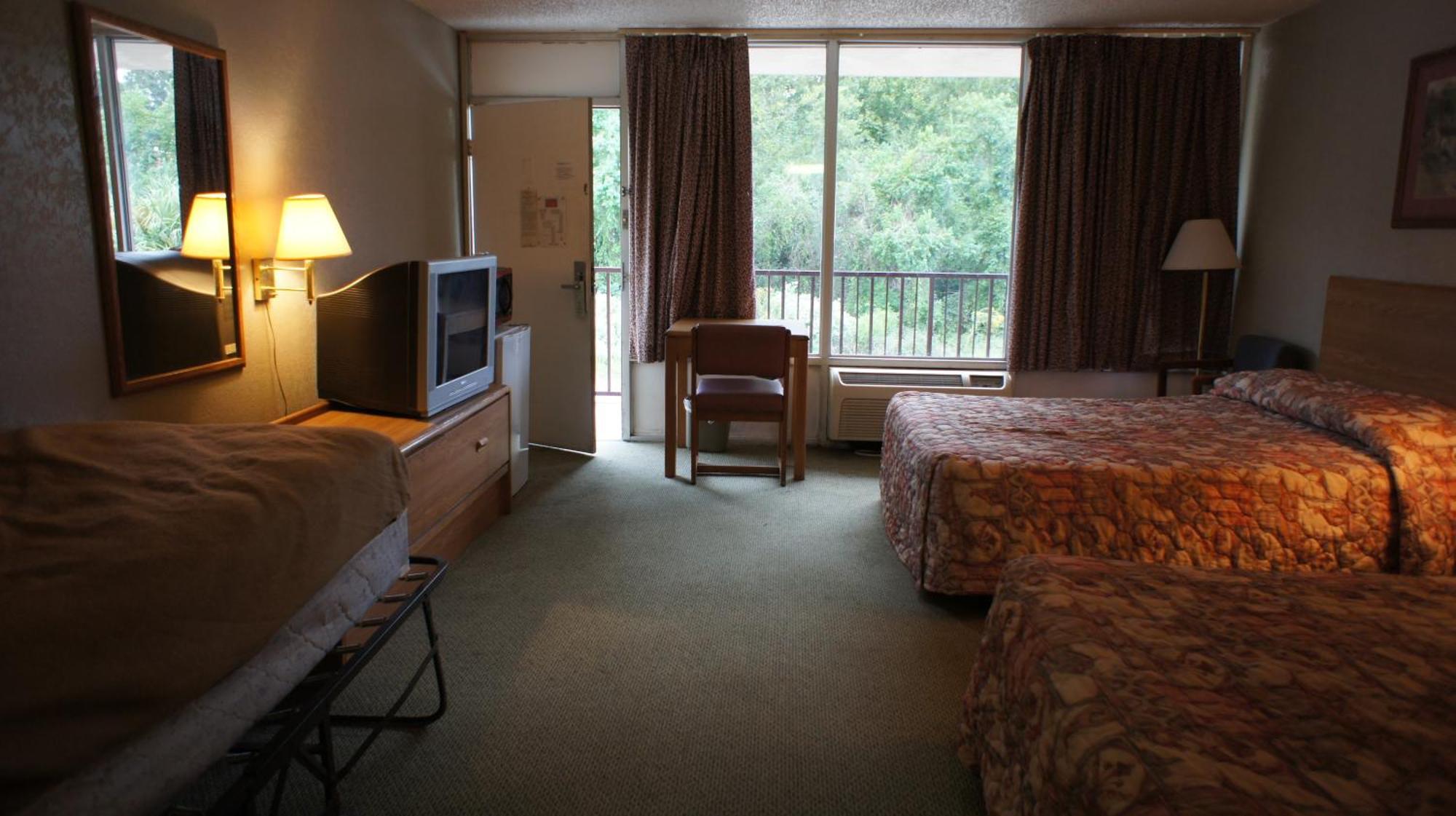 Executive Inn & Suites ออเรนจ์ ห้อง รูปภาพ